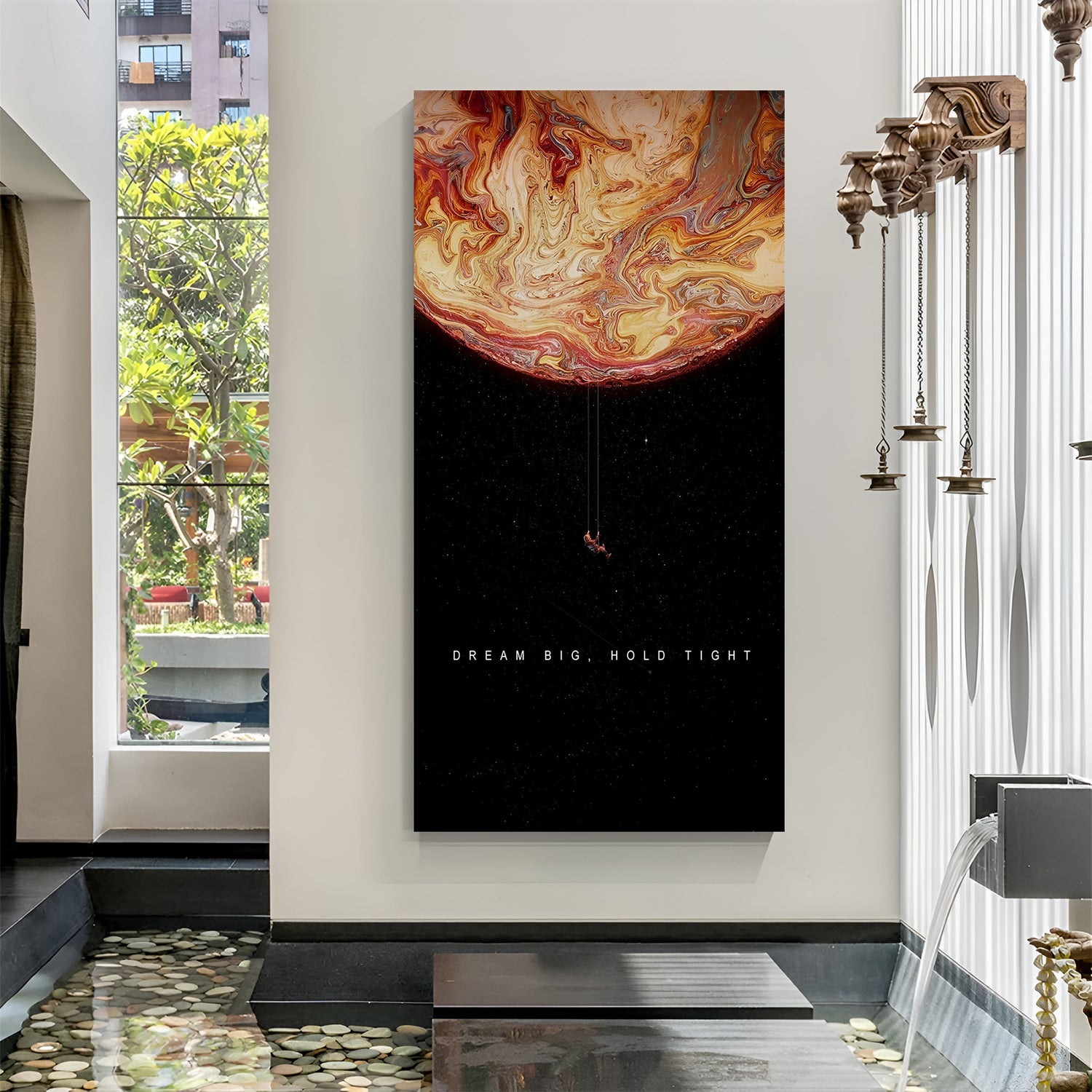 Astronaut hanging on a planet inside a wallet, frameless canvas with Dream Big, Hold Tight quote