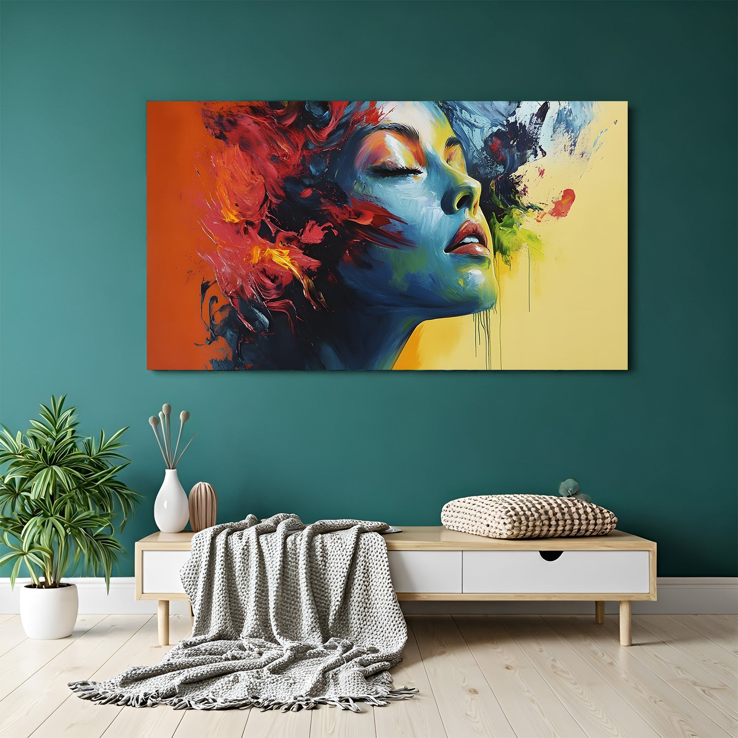 Canvas wrapped modern abstract portrait of woman face with vibrant blue red and yellow expressive paint strokes.