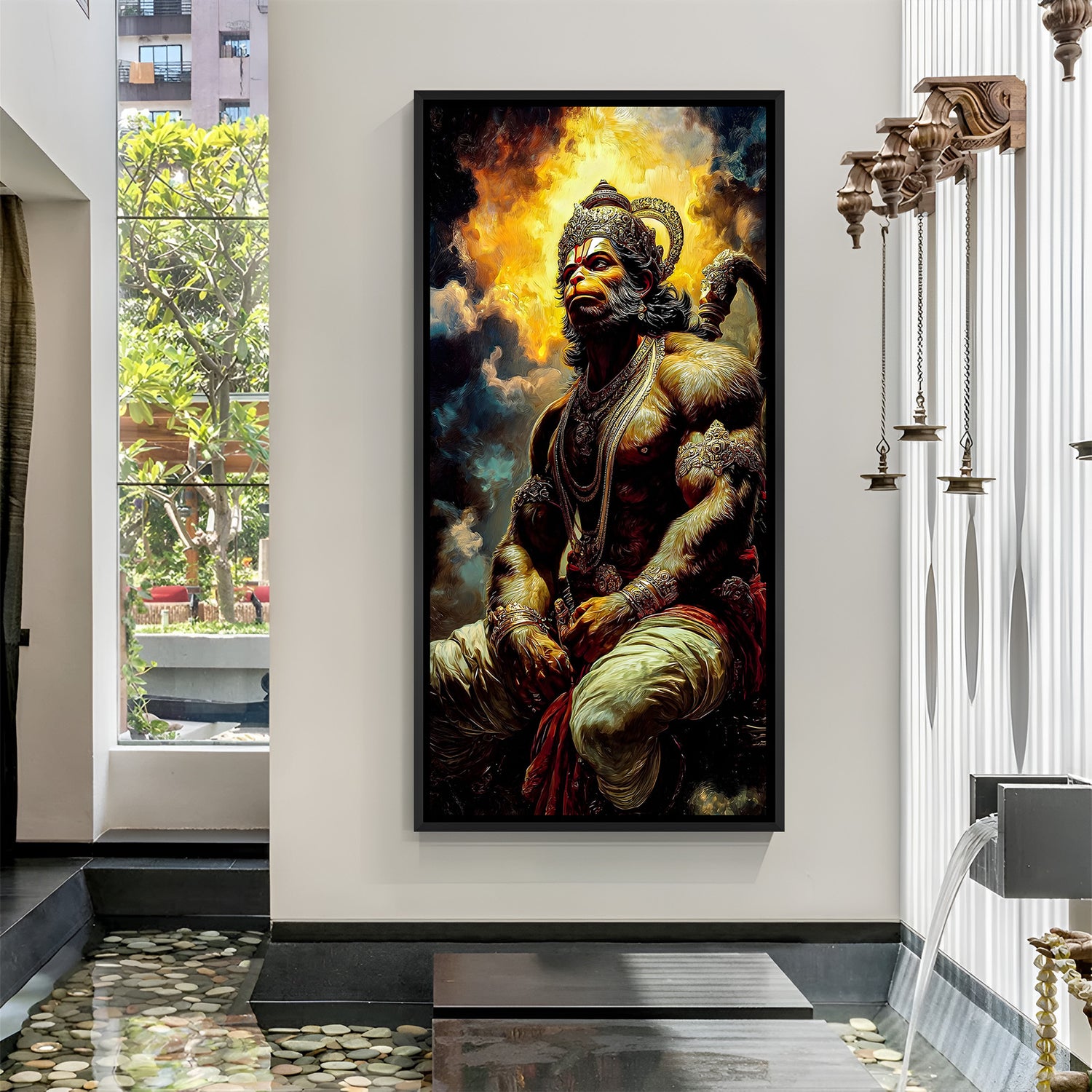 Powerful Hanuman Ji portrait artwork in black frame with fiery sky.