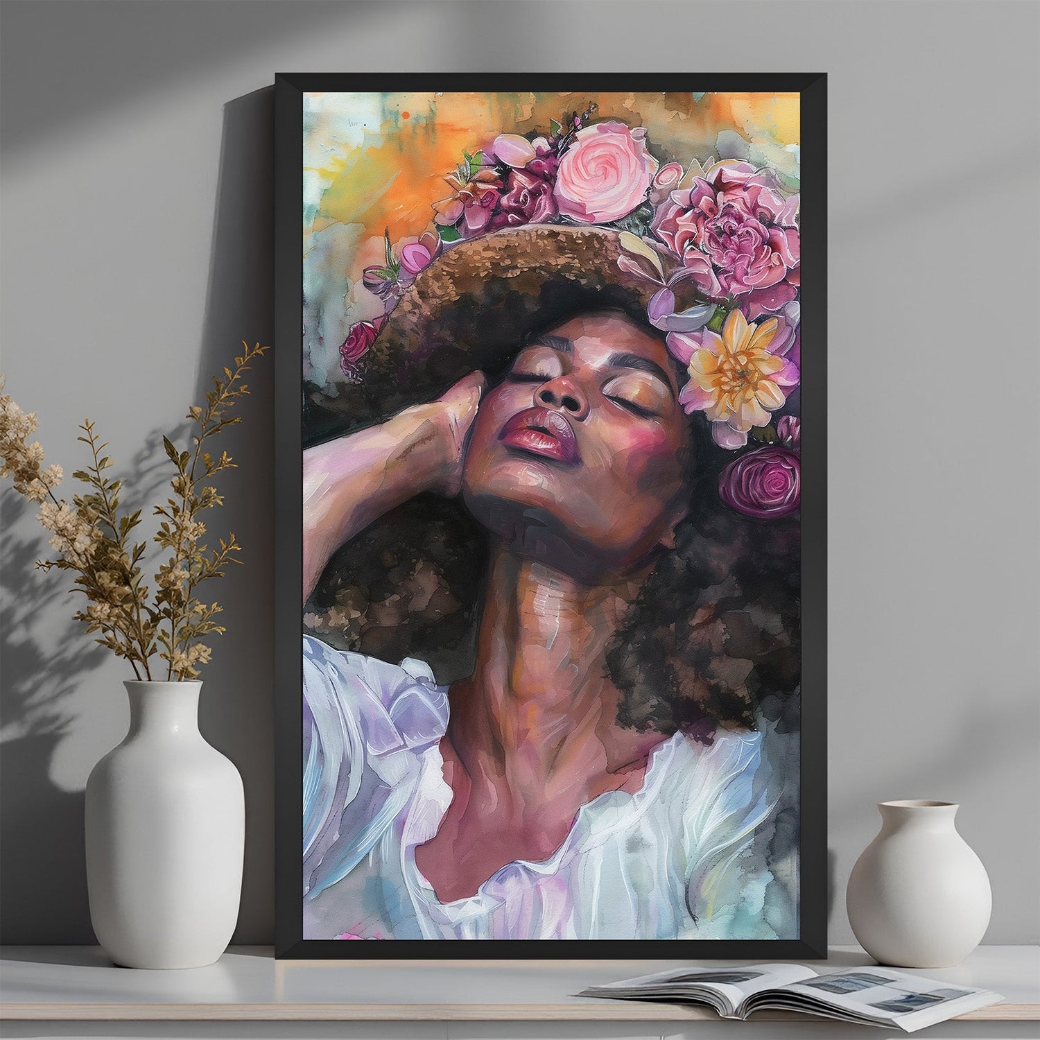 Framed canvas featuring Africa-shaped floral hat in abstract style, set in black frame for modern Afro-inspired decor
