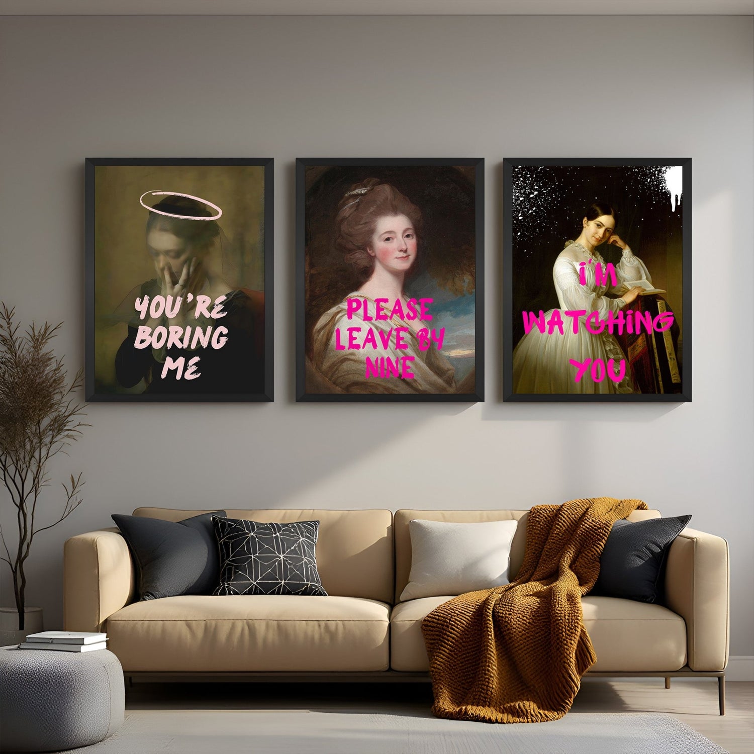 Wall display of a set of 3 canvas prints featuring bold women’s portraits with humorous texts, designed in an altered art style and framed in sleek black floater frames