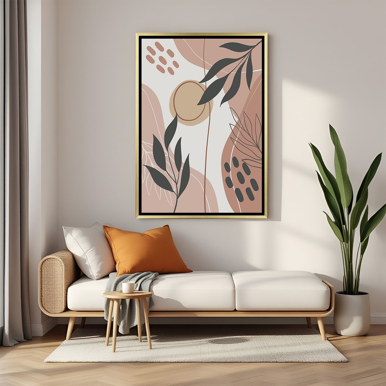 Golden framed artwork with leaf elements and light brown shapes in calming bohemian tones