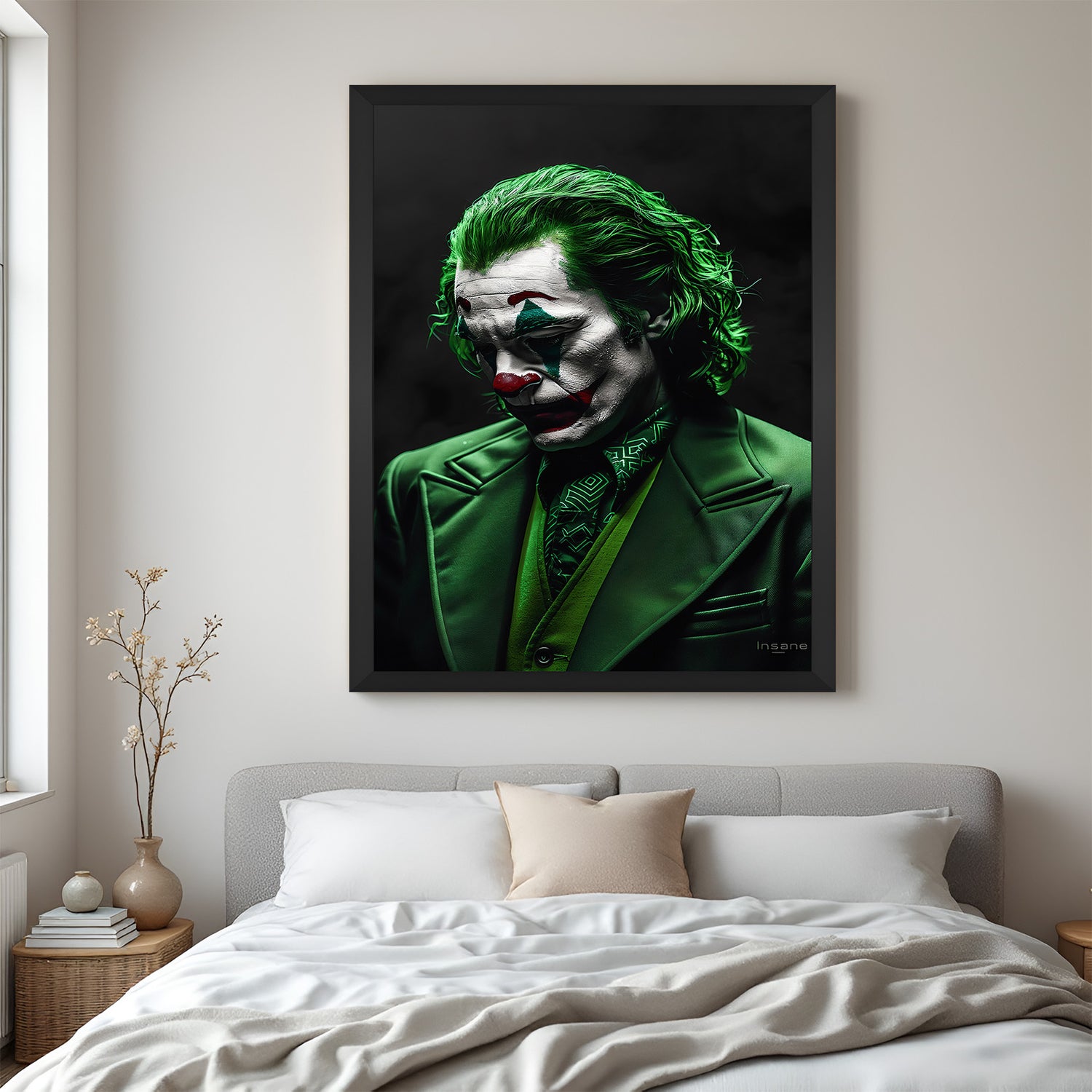 Framed canvas of sad Joker in green suit against a dark black backdrop, perfect for bold modern interiors and expressive wall art styles