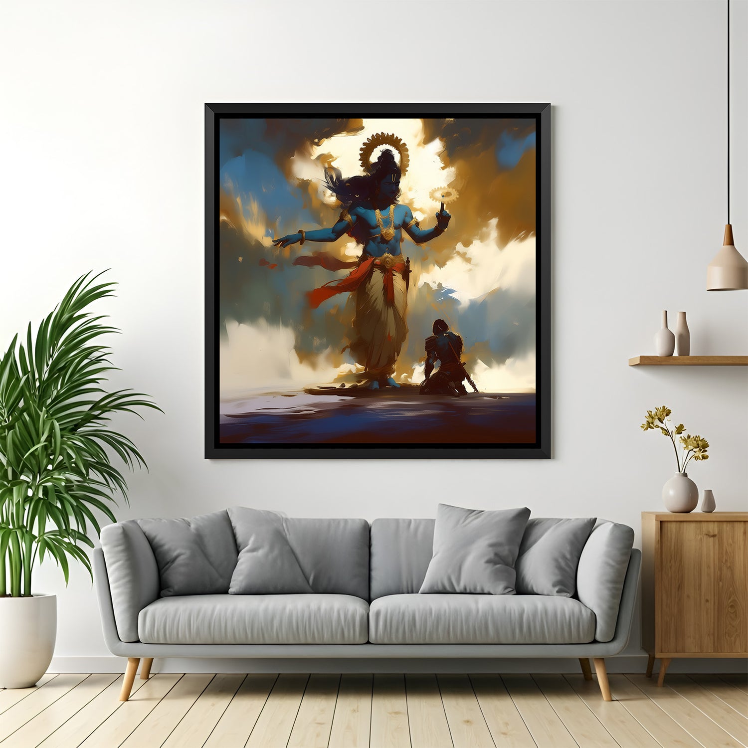 Framed Lord Krishna square artwork in black frame displayed above modern grey sofa.