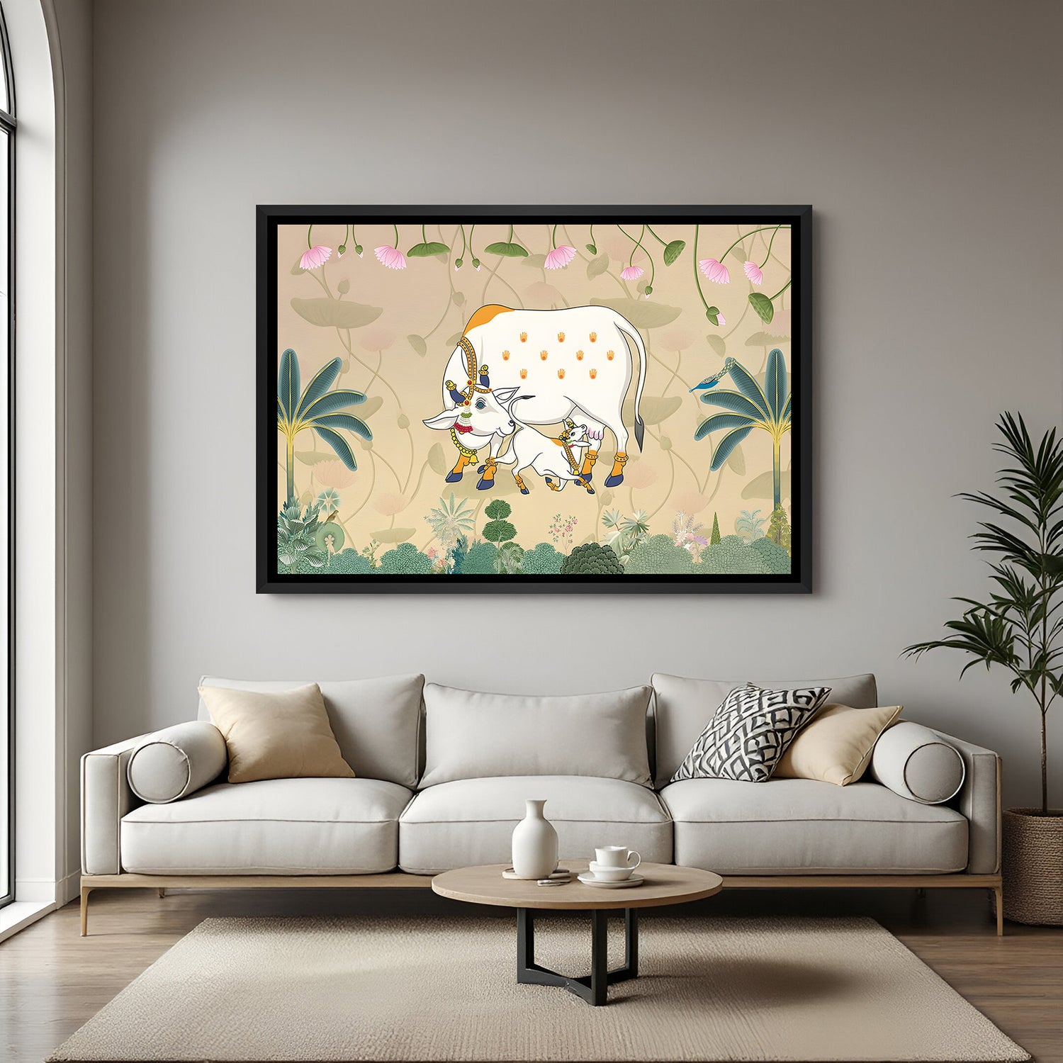 Traditional Kamadhenu Pichwai painting with lotus motifs in elegant black floater frame