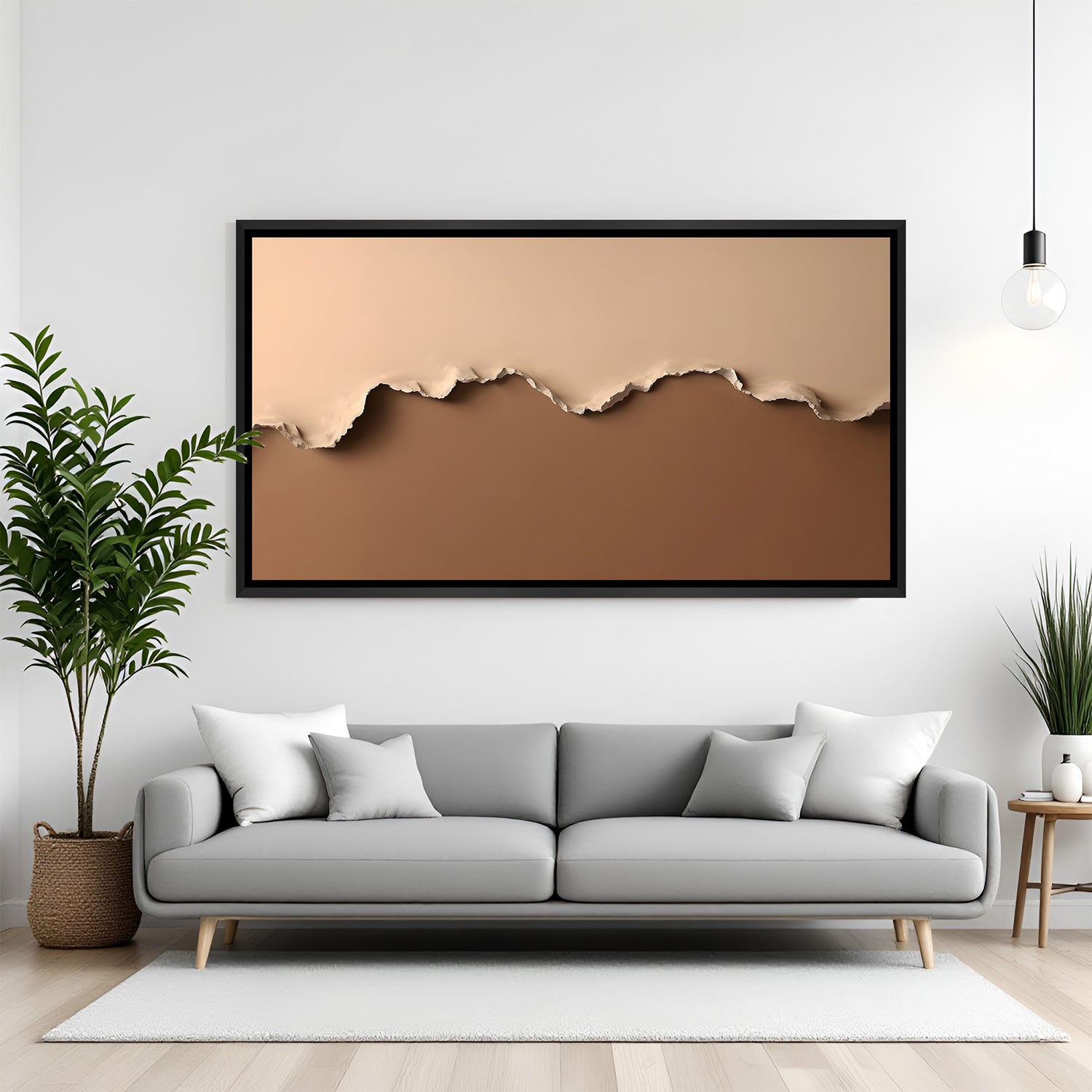 Neutral abstract canvas wall art with layered paper effect in beige and brown tones with black floater frame above sofa in contemporary living room decor