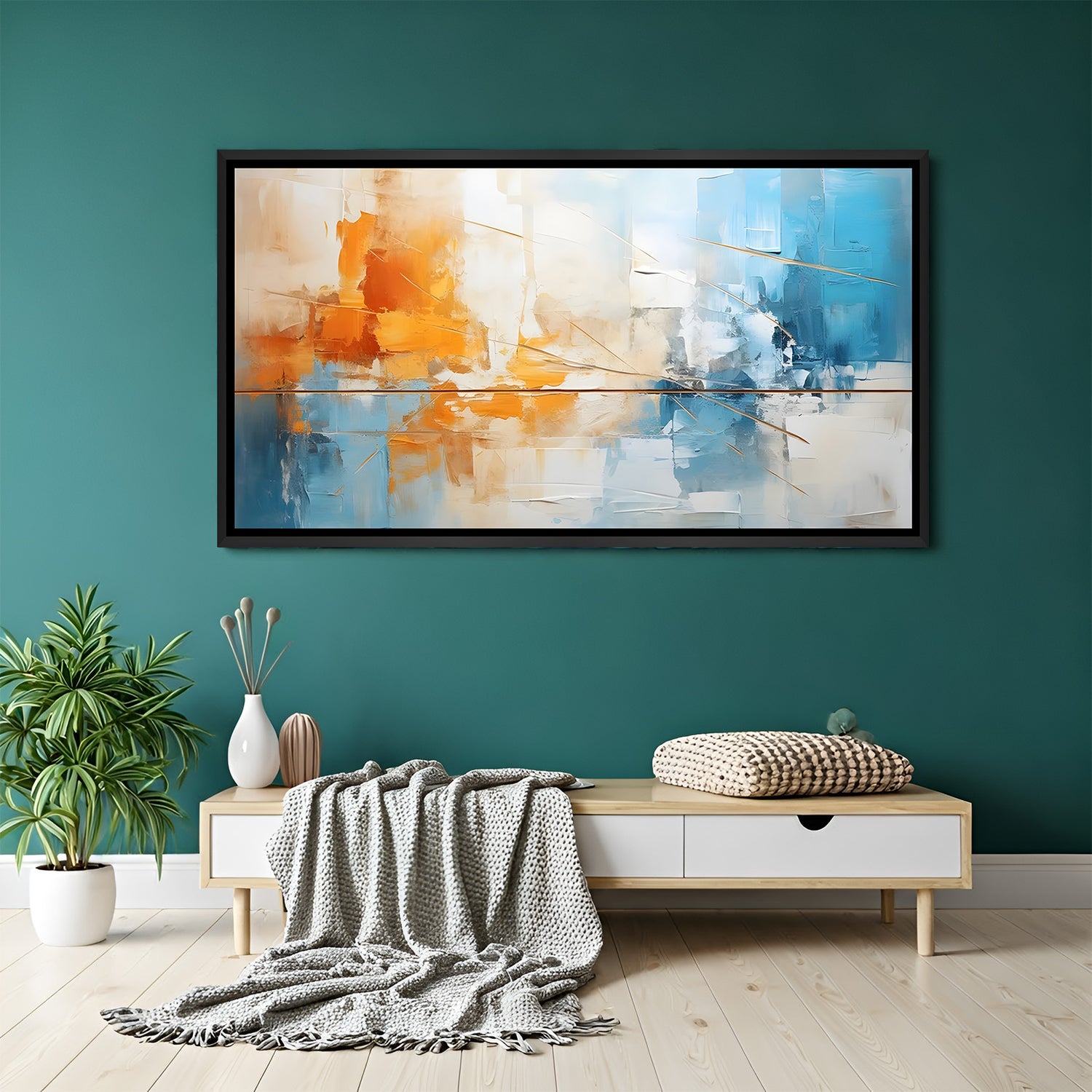 Abstract canvas wall art in blue and orange tones with black floater frame above sofa in modern living room decor