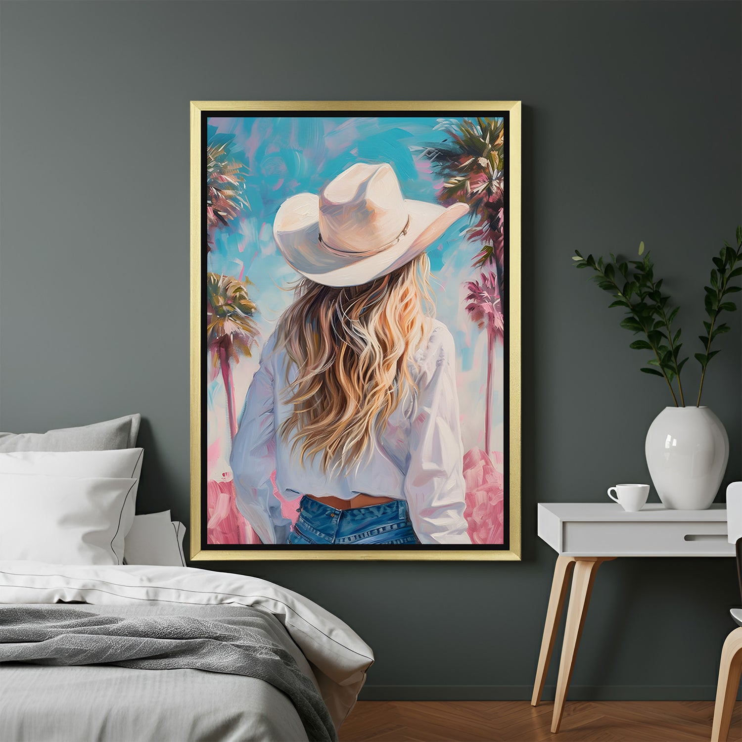 Golden-framed modern boho canvas print featuring a back-view of a woman in a wide hat—ideal for warm, free-spirited interiors with feminine and stylish charm