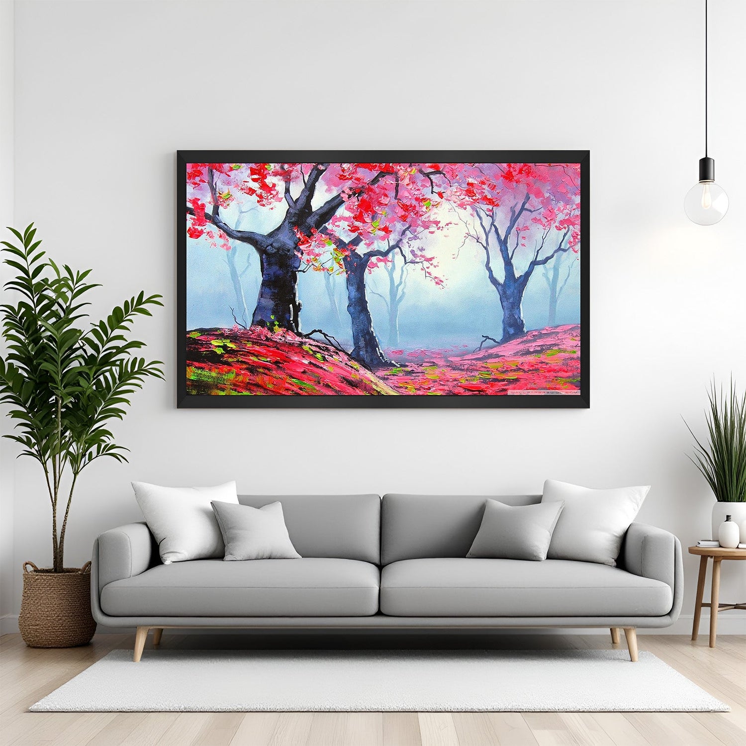 Framed wall art of pink blossoms and scenic hills in black floater frame for modern interiors
