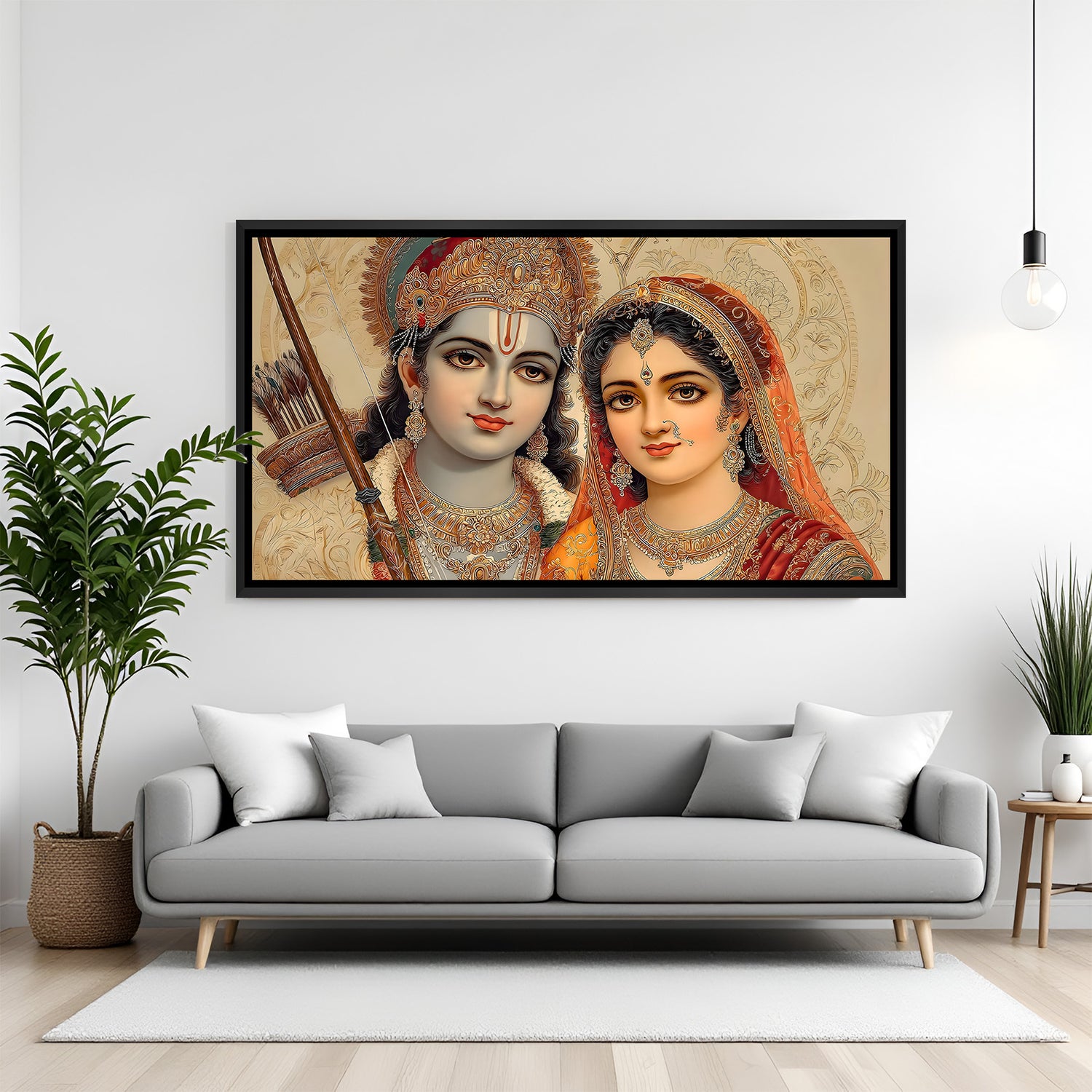 Framed Ram Ji and Sita Ji devotional panorama displayed above modern living room console.
