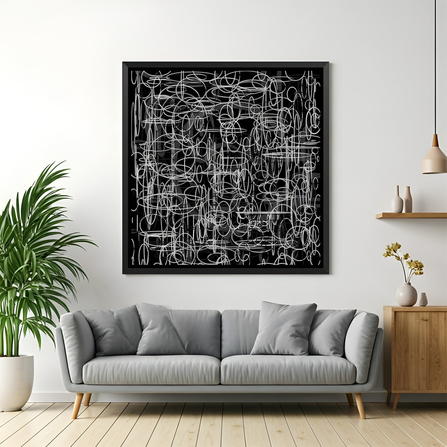 Black and white abstract scribble painting in black floater frame