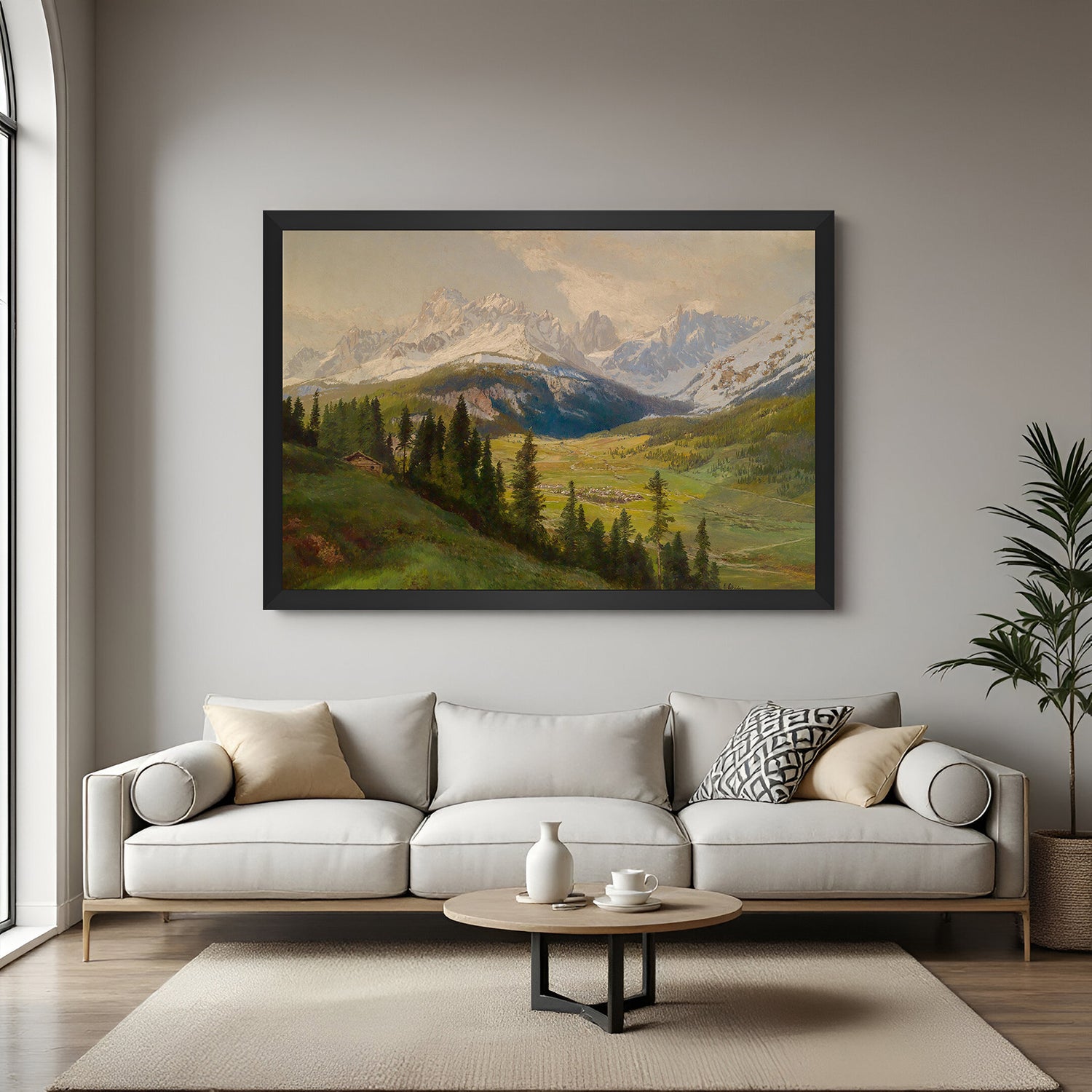 Black-framed canvas of hilly terrain with snow-covered mountains—vintage wall decor for scenic home interiors