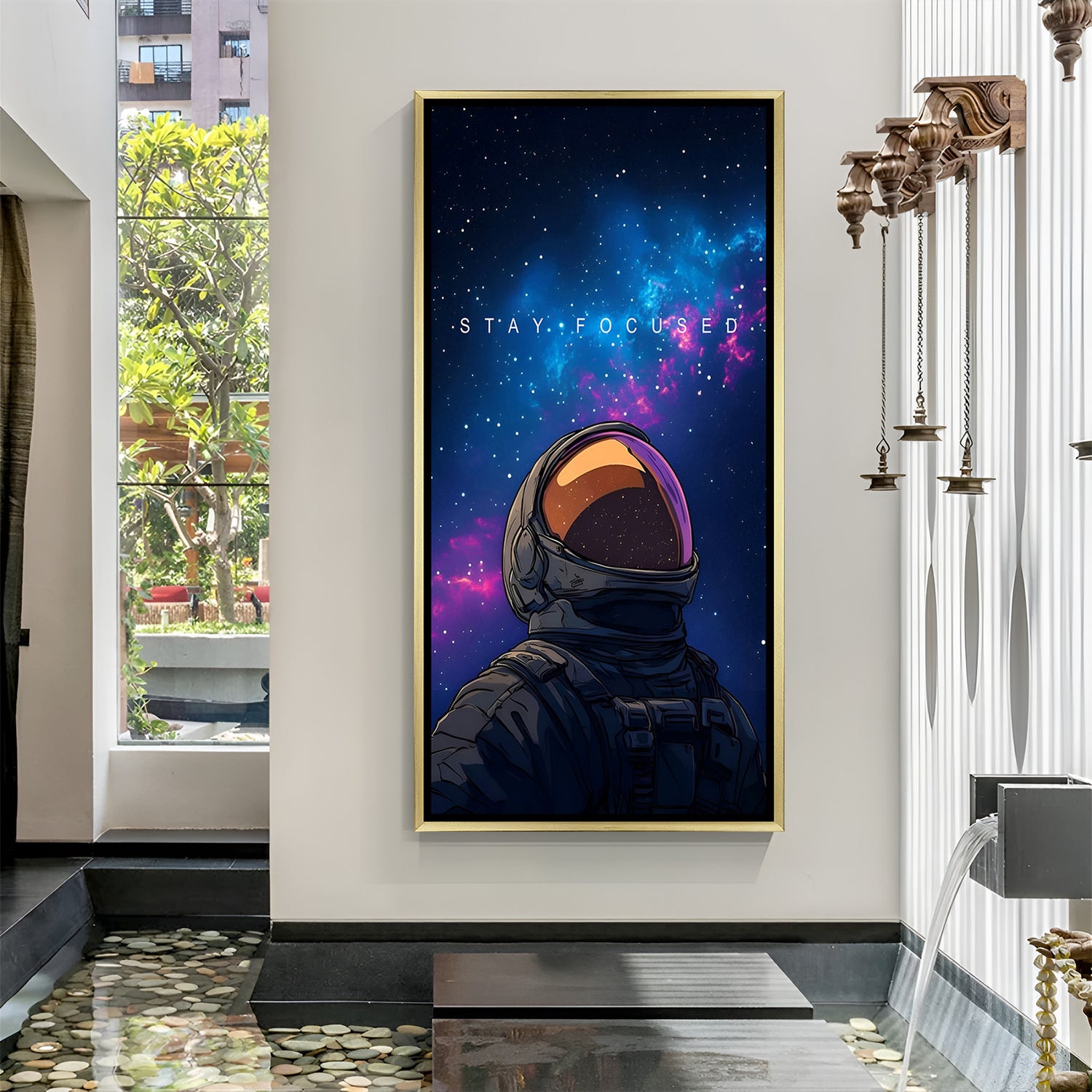 Premium motivational wall art in golden floater frame – astronaut artwork with cosmic background and inspirational message