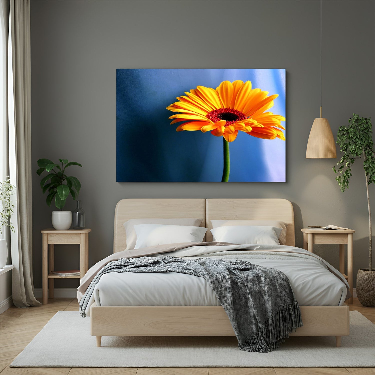 Canvas wall art featuring a single yellow sunflower on a blue background, designed for bright and cheerful home or office decor