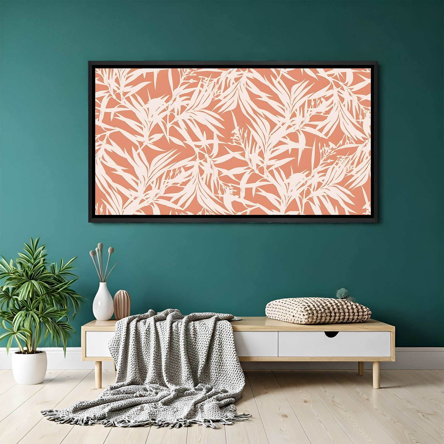 Coral botanical abstract canvas wall art with white leaf pattern in black floater frame above sofa in contemporary living room decor