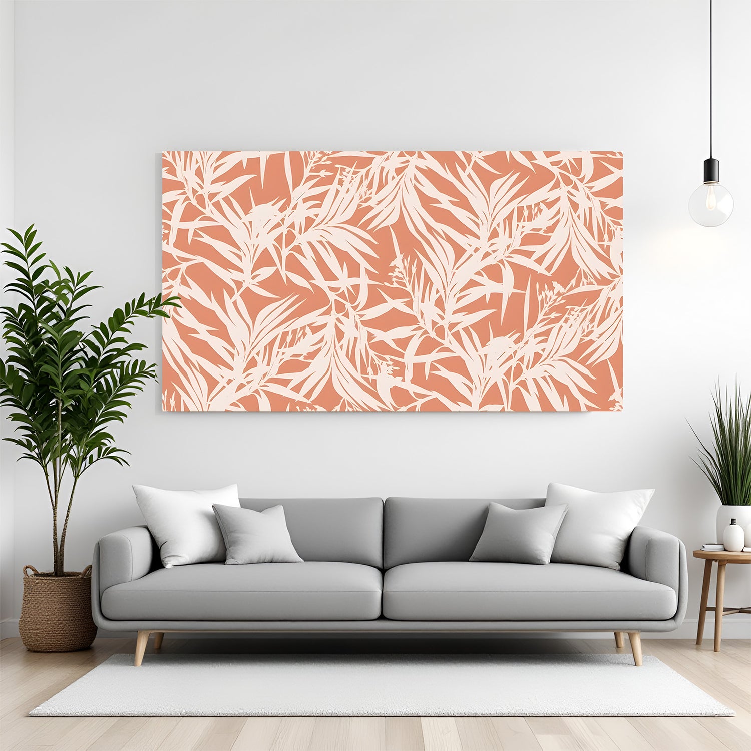 Tropical botanical canvas wall art with white leaf pattern on coral background displayed above sofa in modern living room canvas wrap decor