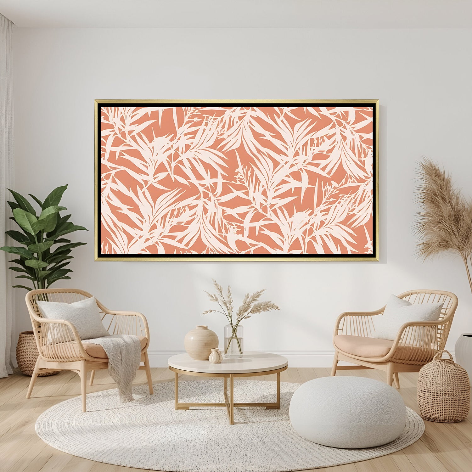 Tropical leaf pattern canvas wall art in coral and white tones with golden floater frame displayed in elegant modern living room decor