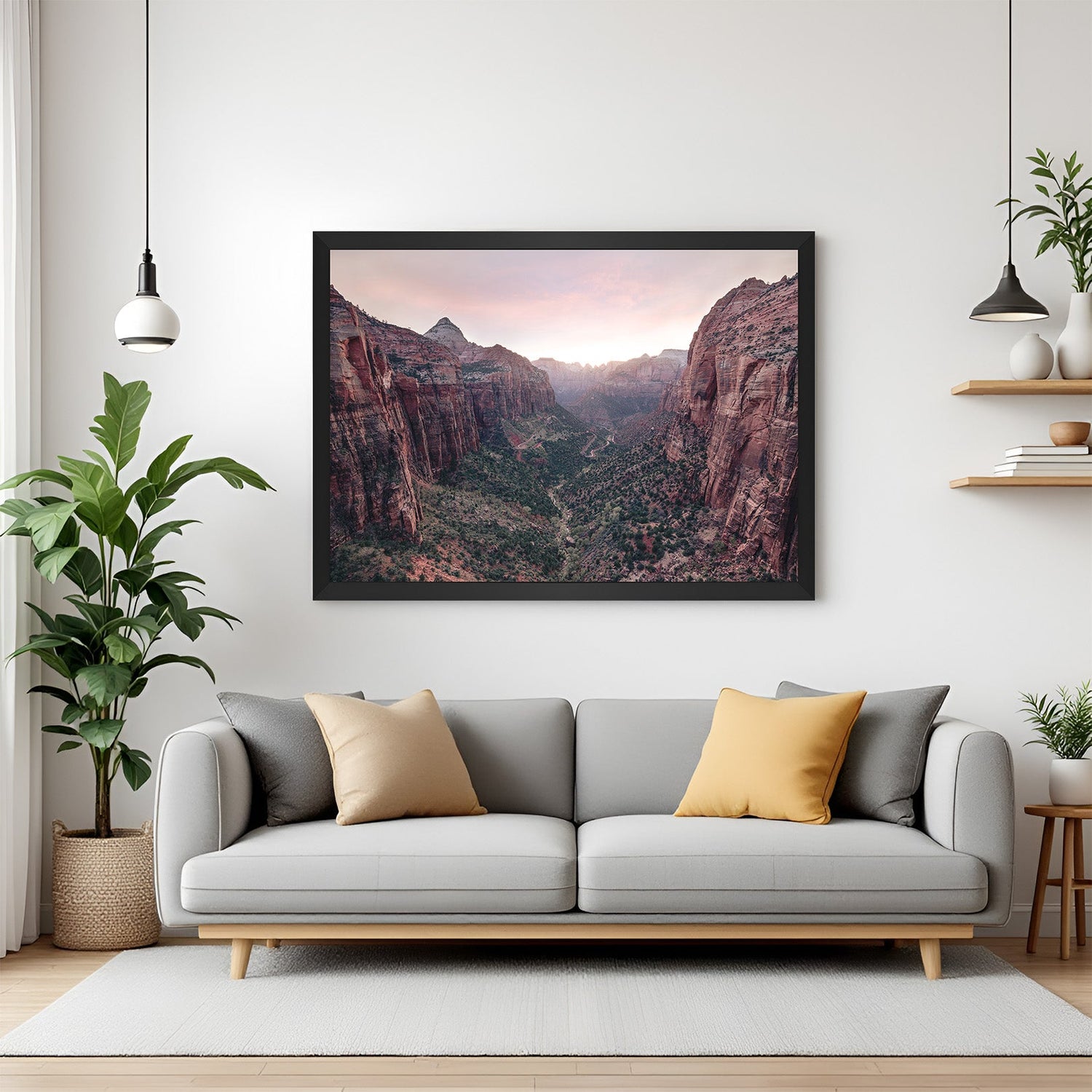 Canvas painting with red rock formations and small trees in a valley, presented in a black floater frame for dramatic and earthy wall art display