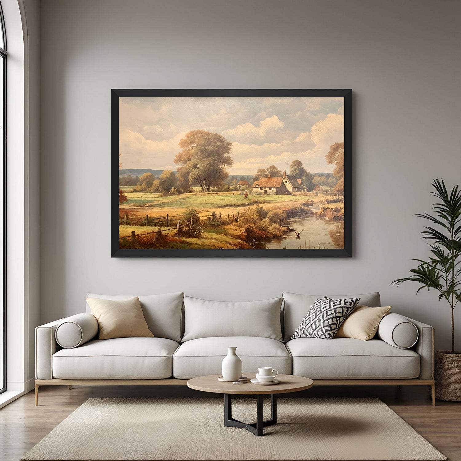Black-framed large canvas of vintage countryside with river, trees, and rustic house—classic wall art