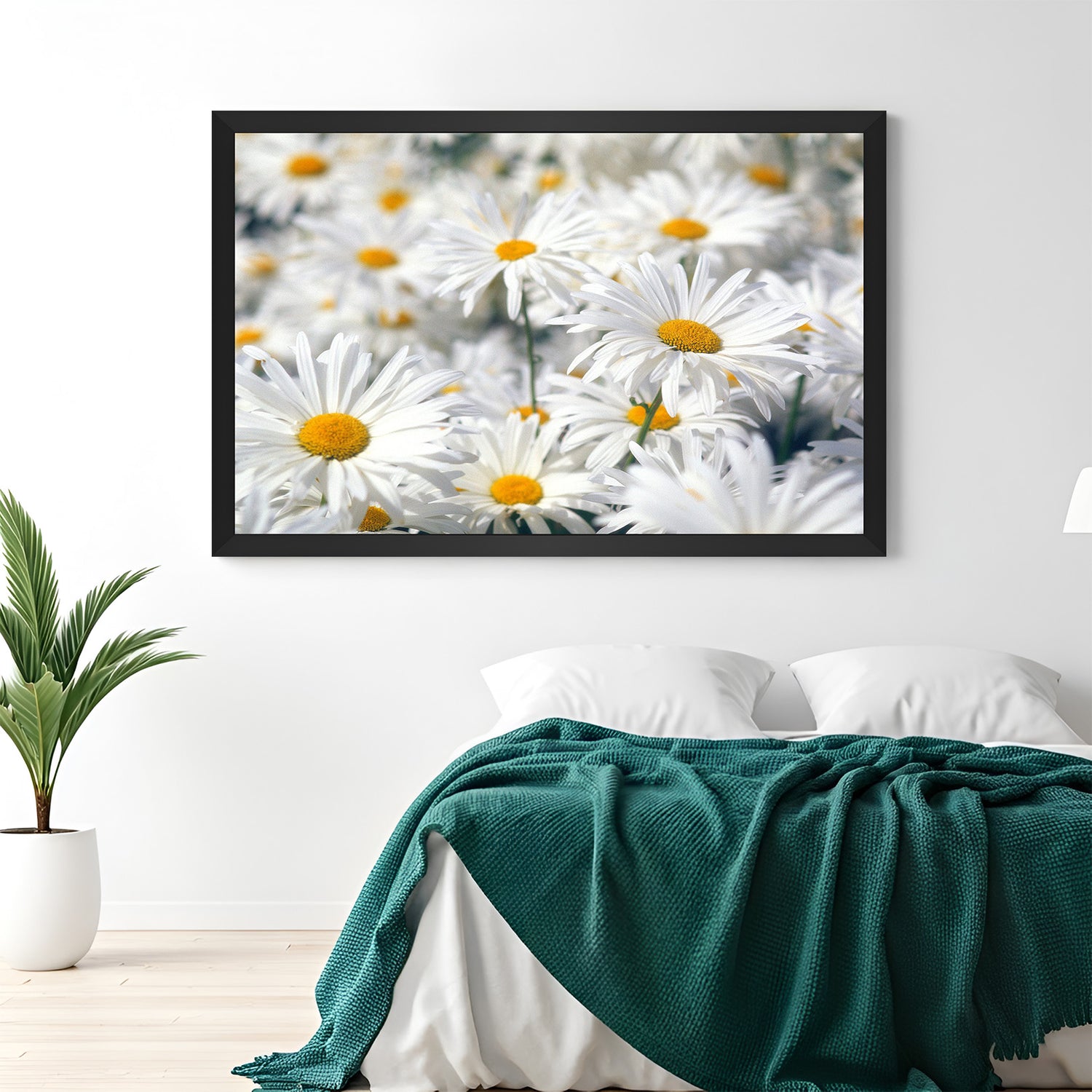 Framed canvas of white daisies spread across a meadow with black floater frame, ideal for peaceful and bright wall decor