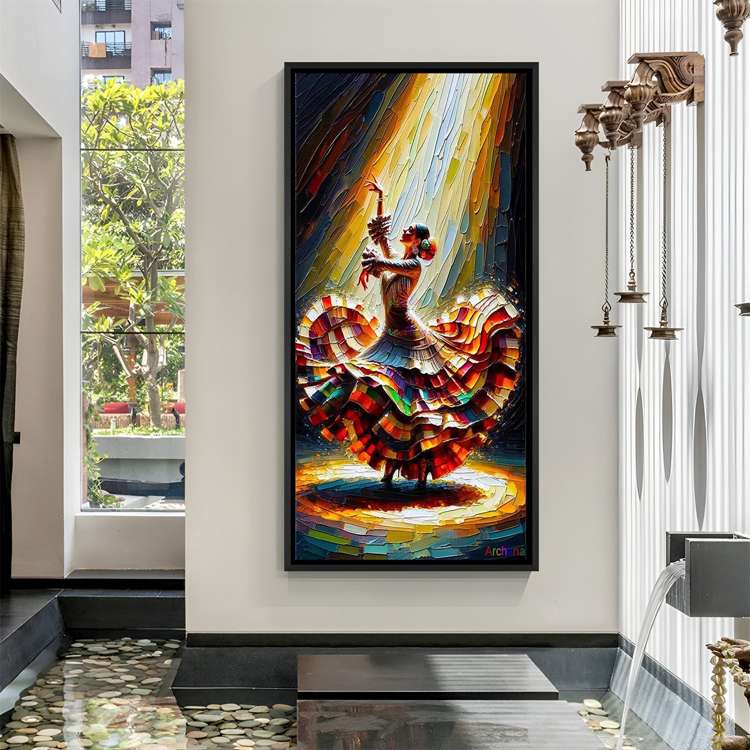 Hand-painted canvas wall art of a woman dancing in a colorful flowing dress in black floater frame