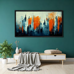 Blue and orange abstract skyline canvas wall art in black floater frame above sofa in contemporary living room decor
