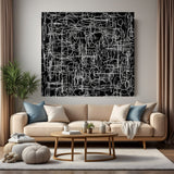Abstract scribble canvas wall art with white lines on black background