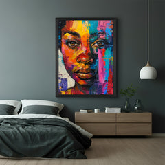 Framed canvas of African girl portrait with colorful brushstroke face art, black floater frame perfect for stylish modern interiors