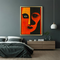 Golden-framed canvas wall art showcasing bold red and black African patterns, perfect for statement walls and culturally rich interiors