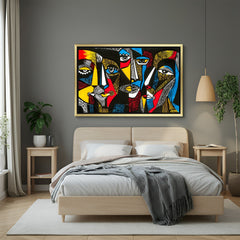 Golden-framed canvas of a tribal group in African attire, artistically illustrated for rich, Afrocentric wall decor