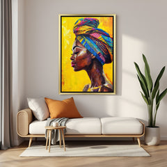 Golden-framed canvas of African woman with turban and artistic yellow tones, ideal for Afrocentric and warm contemporary decor