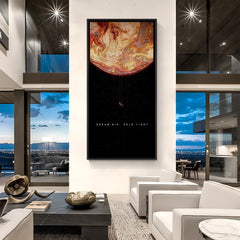 Dream Big astronaut wall art in black footer frame with motivational quote and surreal space theme