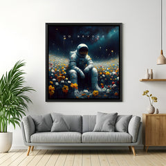 Framed astronaut artwork with floral background and inspiring quote – ideal for modern workspace or home office.