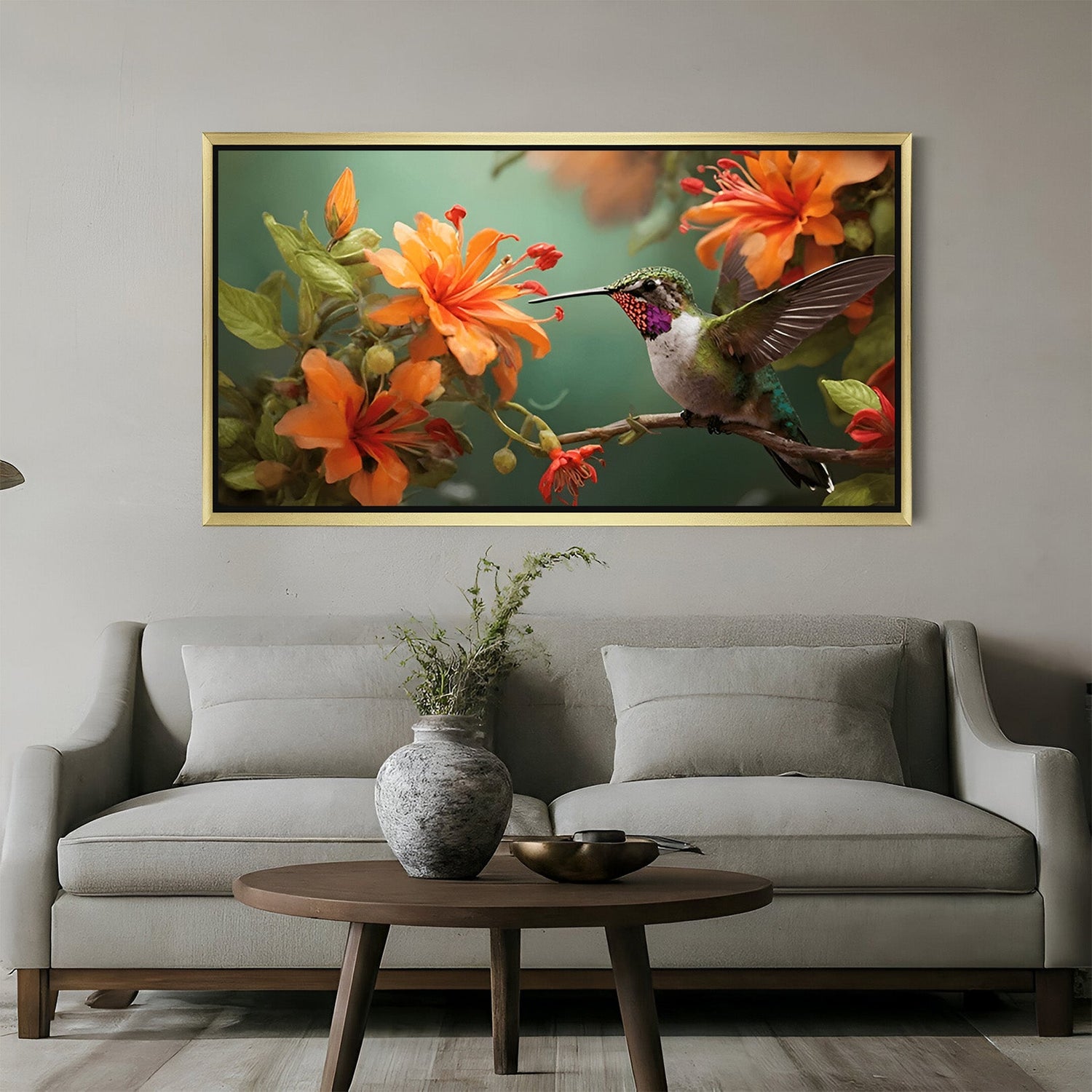 Golden-framed wall art of flower and bird scene, ideal for elegant and calm interiors