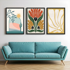 Set of 3 boho canvas prints featuring a desert landscape, artistic floral design, and minimal flower print – perfect for warm, nature-inspired spaces