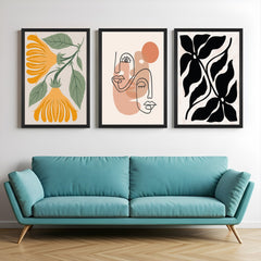 Set of 3 boho canvas prints featuring abstract face line art, black flower print, and soft floral artwork – ideal for stylish home decor