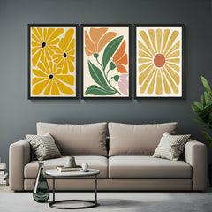 Boho wall art set of 3 including floral prints and a painted-style sun – earthy tones and natural charm for calming home decor
