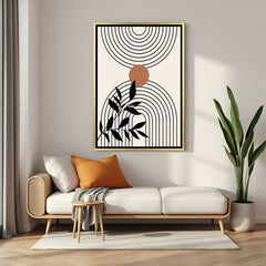 Golden frame canvas wall art featuring leaf stem, centered circle and circular lines in boho style