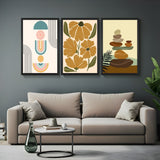 Set of 3 boho wall art prints with minimal abstract design, floral artwork, and balanced rocks – perfect for peaceful and earthy interiors