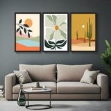 Set of 3 boho wall art prints featuring landscape with sun, green flower, and desert cactus scene – ideal for earthy and calming interiors