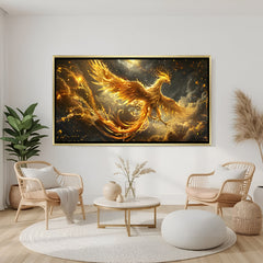 Elegant golden phoenix wall art in gold frame with glowing wings and celestial cloud backdrop.
