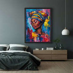 Framed canvas artwork of African women illustrated in abstract vibrant tones with ethnic fashion details, black frame for contemporary decor