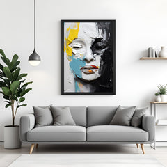 Black frame canvas of colorful abstract face painting – artistic wall art for bold, creative home interiors