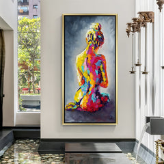 Golden-framed canvas art of a woman’s back view in colorful brush strokes—perfect for elegant, modern, and artistic interior wall decor