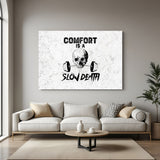 Canvas wall art with white background, skull in center, and bold quote: Comfort is a Slow Death