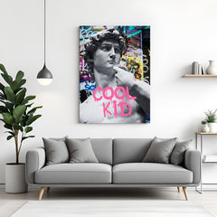 Altered art canvas of Michelangelo’s David statue with "Cool Kid" text, blending classical sculpture with urban graffiti style for modern wall decor with rebellious flair