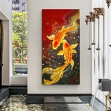 Two golden koi fish swimming in dark shimmering water with dramatic red and blue background in premium canvas wrapped frame