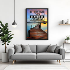 Motivational canvas wall art with black floater frame featuring difficult roads quote