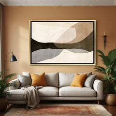 Elegant abstract earth tone wall art with golden frame and soft flowing design