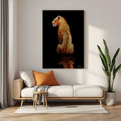 Elegant leopard sitting with back facing, canvas wall art on black background